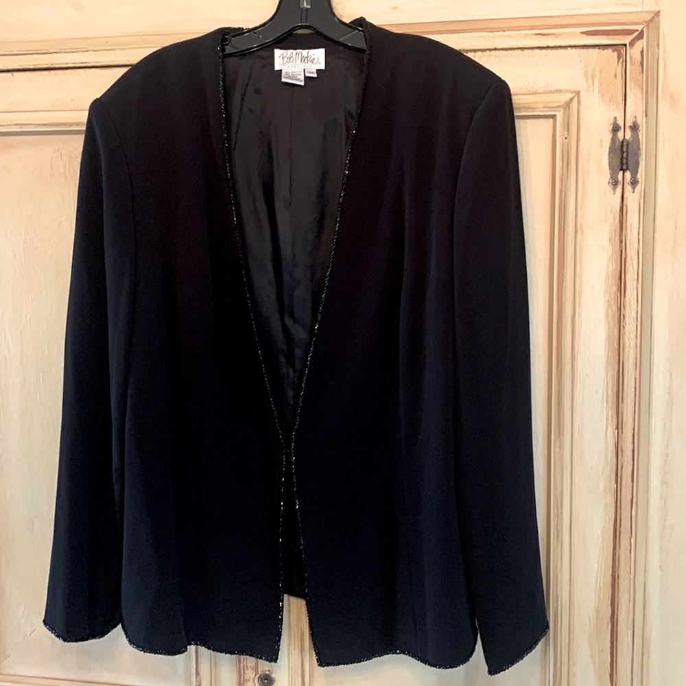 NEW with tags. Size 22 Bob Mackie jacket. Fully lined.